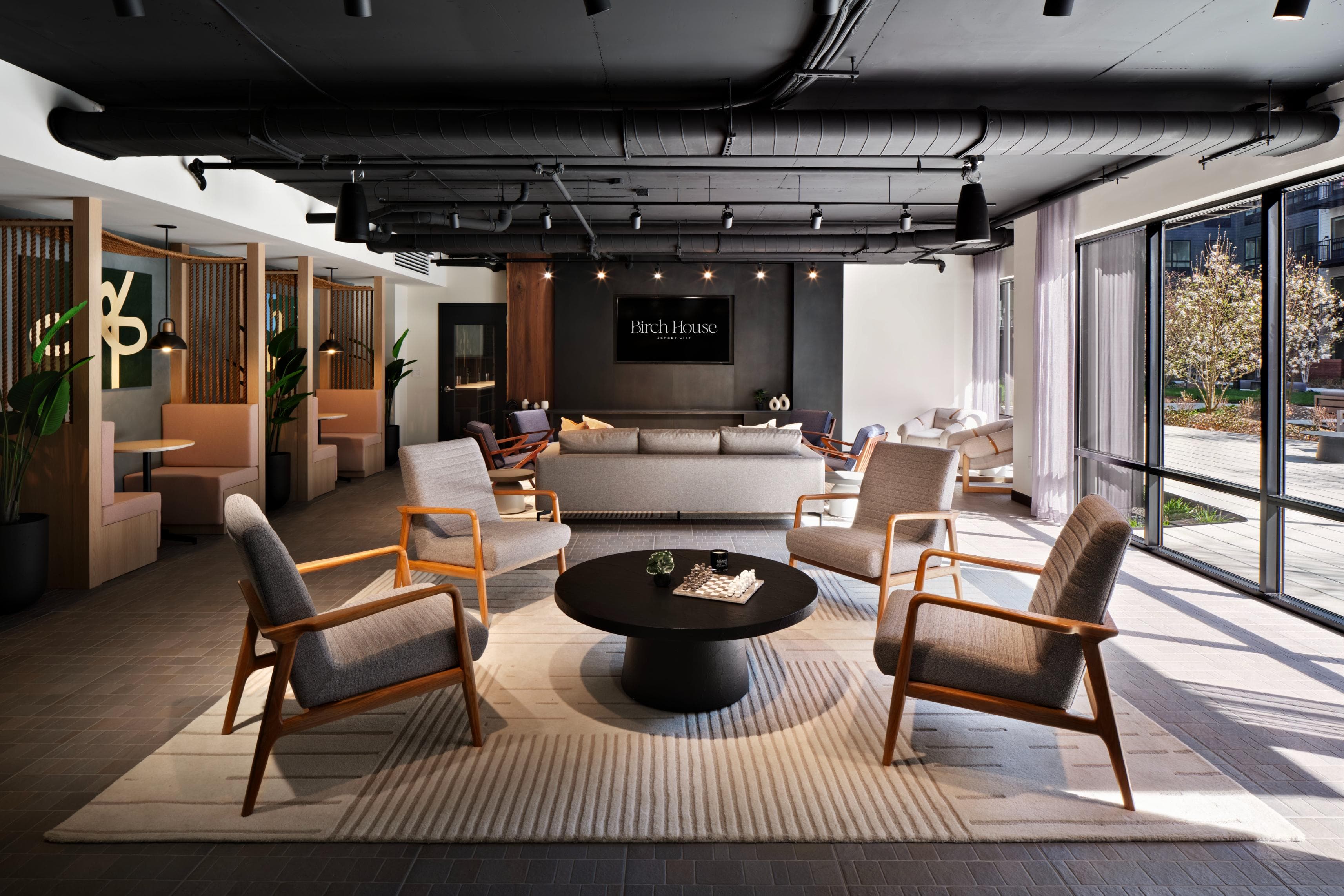 Media room with TV and lounge seating